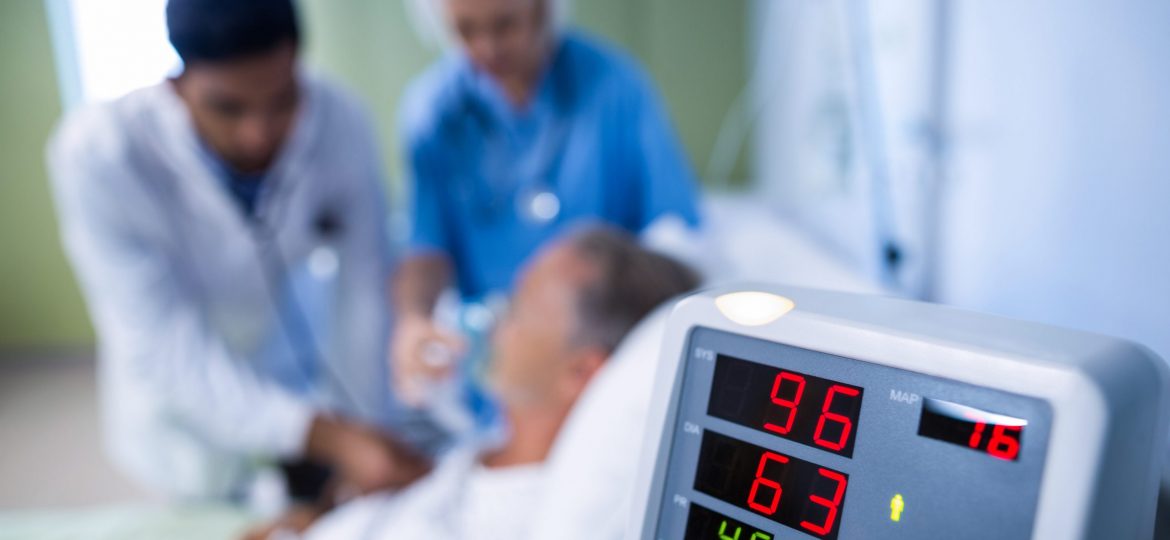 Heart rate monitor and patient getting treatment in hospital